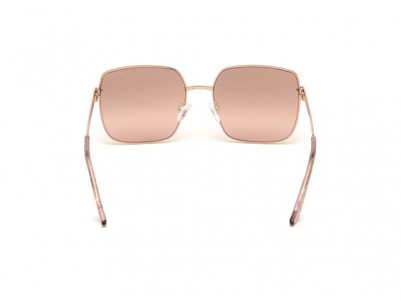 Occhiali da sole Guess GU7615 (28U) colore oro rosé lucido forma geometrico lenti bordeaux specchiato