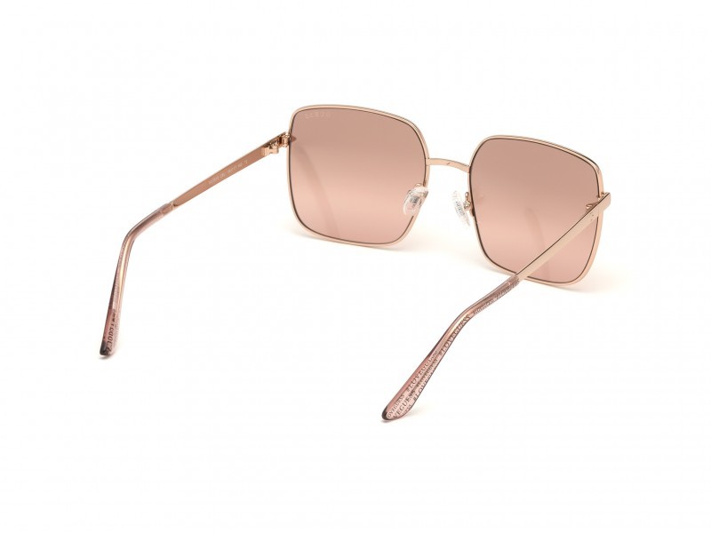 Occhiali da sole Guess GU7615 (28U) colore oro rosé lucido forma geometrico lenti bordeaux specchiato