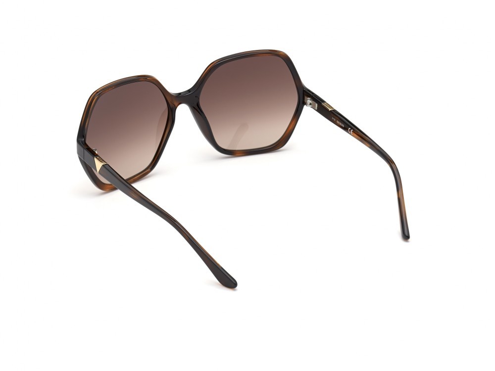 Occhiali da sole Guess GU7747 (52F) colore avana scura forma geometrico lenti marrone grad.