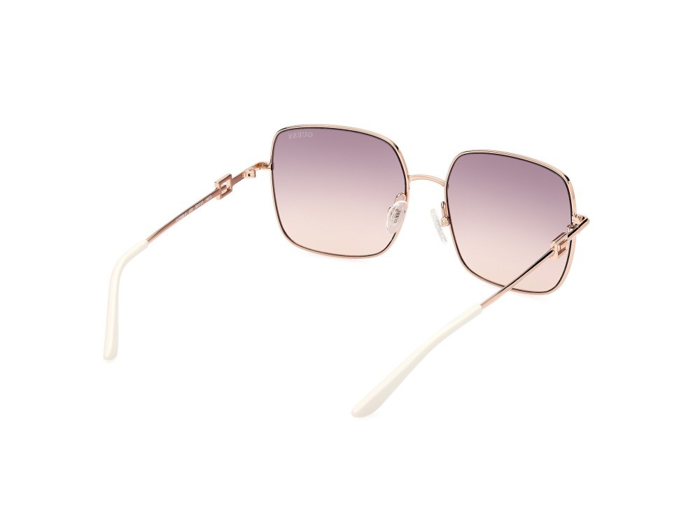 Occhiali da sole Guess GU7906-H (28Z) colore oro rosè lucido forma quadrato lenti viola sfumato/specchiato
