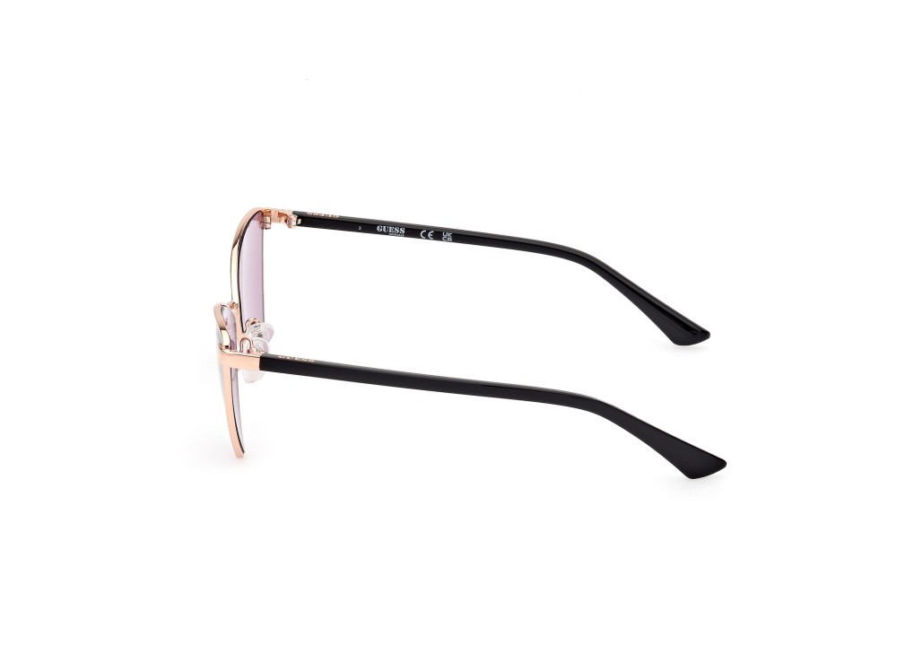 Occhiali da sole Guess GU8286 (28Y) colore oro rosè lucido forma geometrico lenti viola