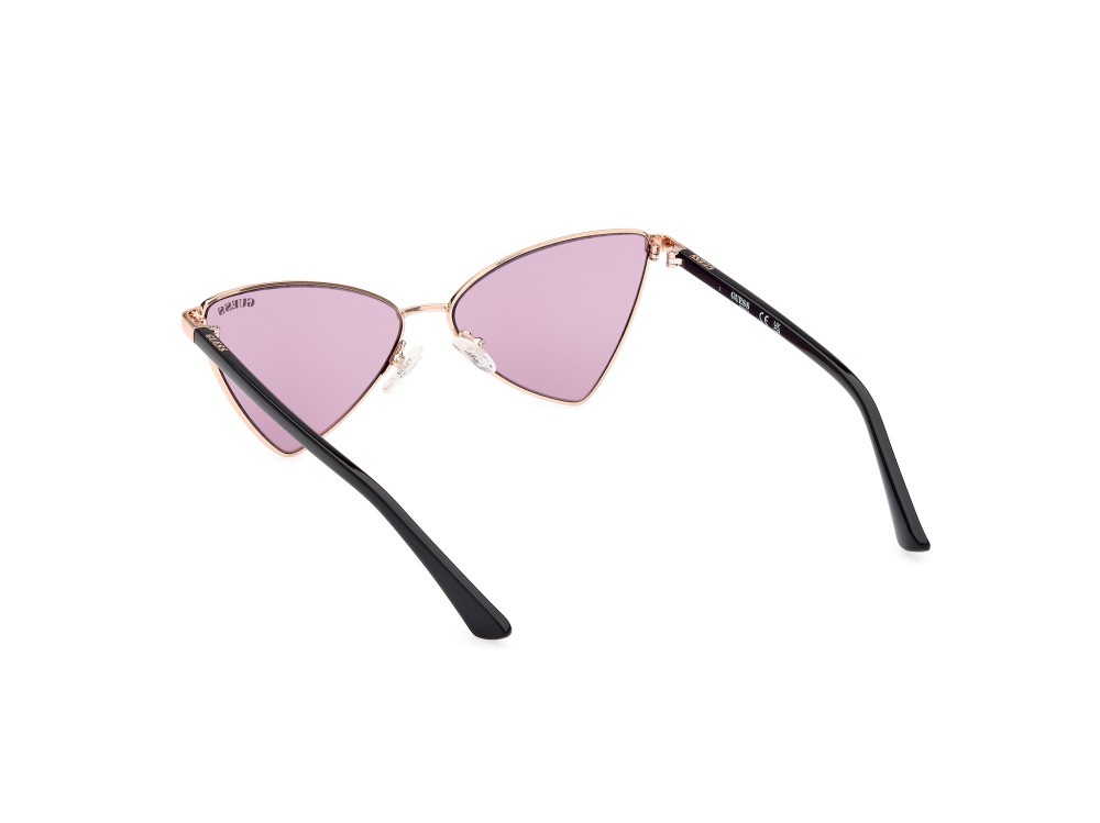 Occhiali da sole Guess GU8286 (28Y) colore oro rosè lucido forma geometrico lenti viola
