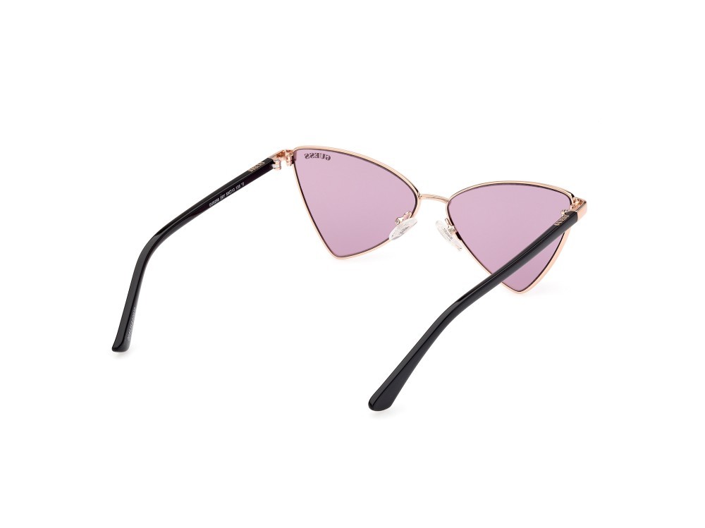 Occhiali da sole Guess GU8286 (28Y) colore oro rosè lucido forma geometrico lenti viola