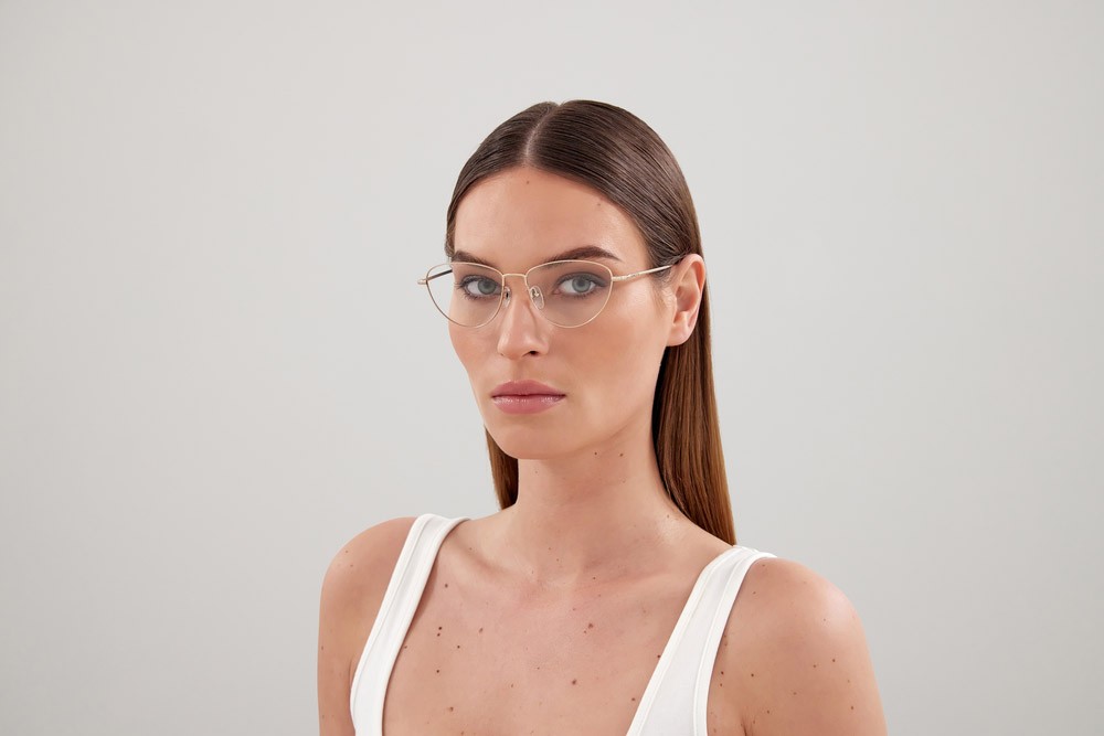 Occhiali da vista Gucci GG1185O-001 colore oro forma cat eye lenti trasparente
