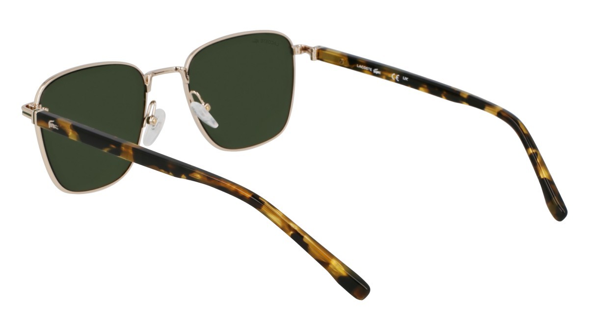 Occhiali da sole Lacoste L265S (712) colore light gold forma rettangolare lenti solid green