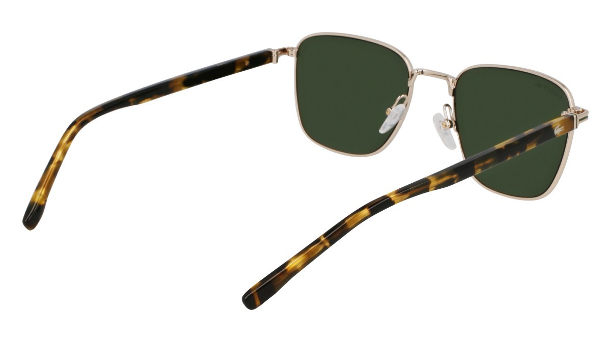 Occhiali da sole Lacoste L265S (712) colore light gold forma rettangolare lenti solid green