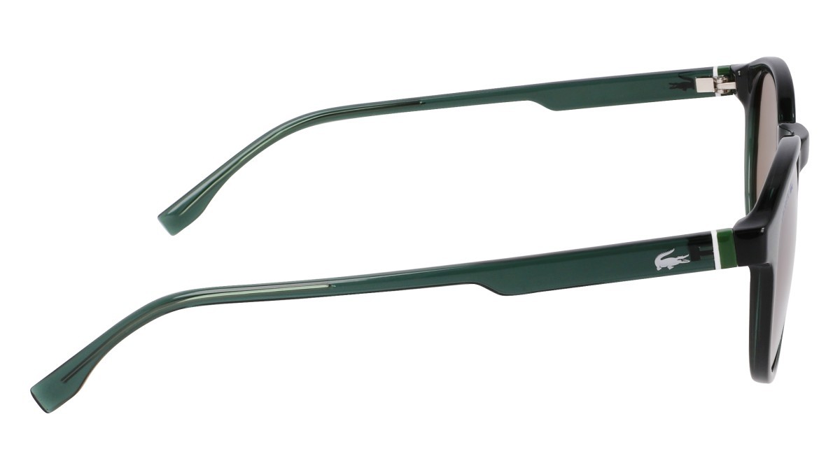 Occhiali da sole Lacoste L6030S (301) colore transparent green forma rotondo lenti brown