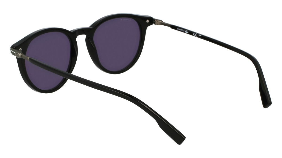 Sonnenbrillen Lacoste L6034S (001) farbe black form rund gläser solid grey