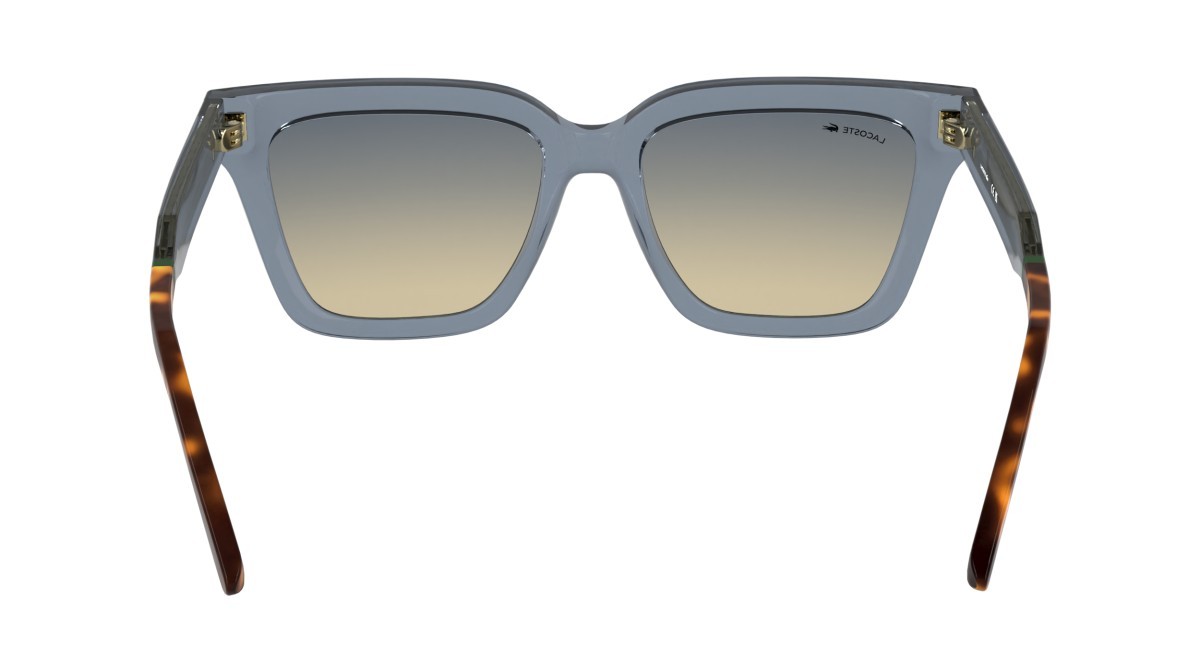 Sonnenbrillen Lacoste L6063S N (038) farbe transparent light grey form rechteckig 