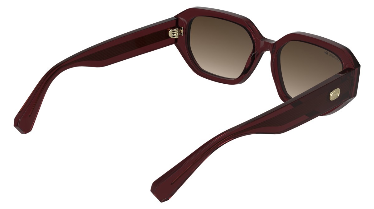 Occhiali da sole Lacoste L6091S (601) colore transparent burgundy forma rettangolare lenti gradient brown