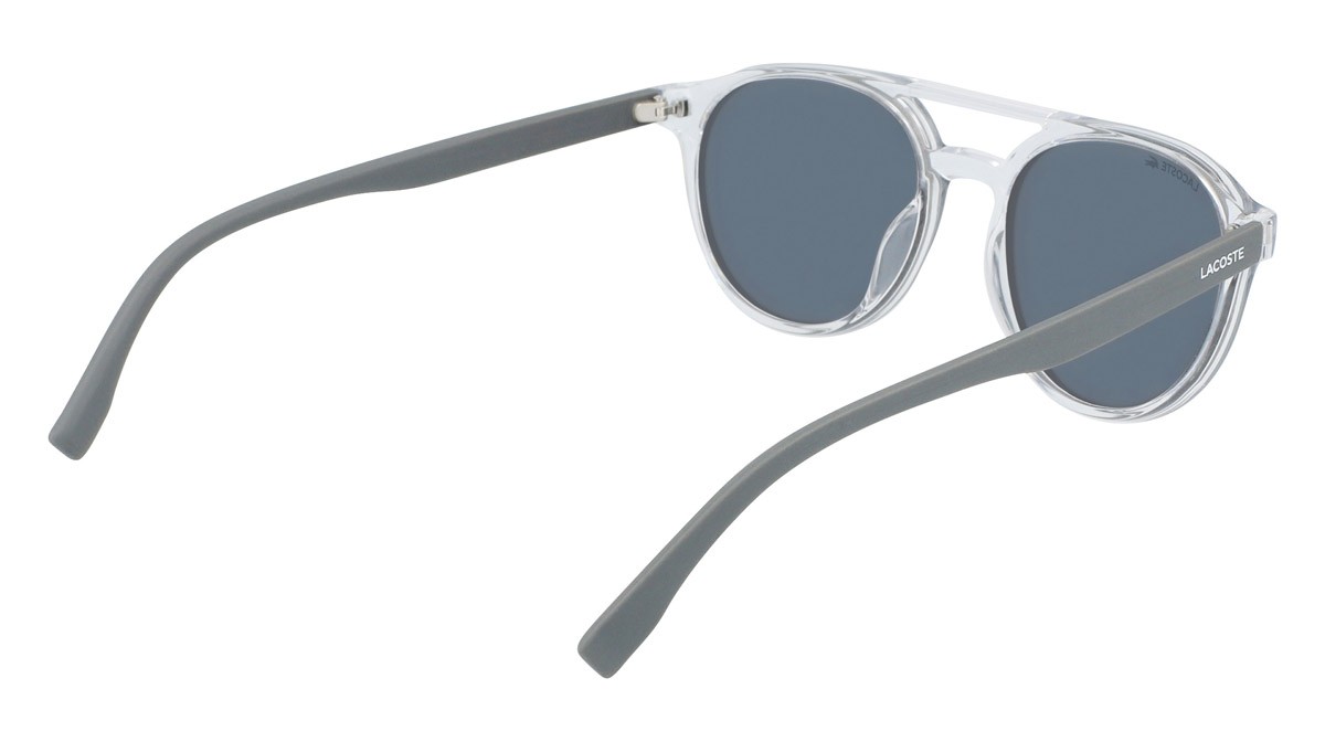 Sunglasses Lacoste L881S (057) color crystal/grey shape round 