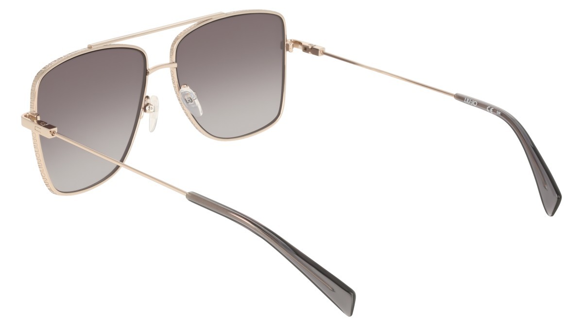 Occhiali da sole Liu Jo LJ165S (712) colore light gold forma aviator lenti gradient grey