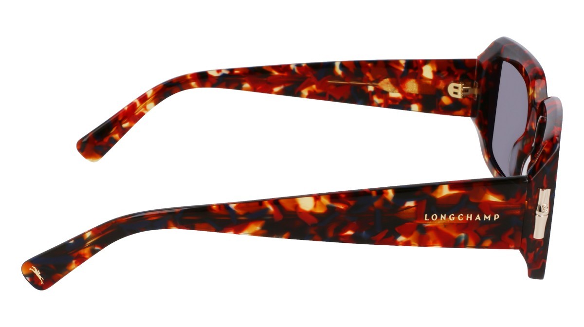 Occhiali da sole Longchamp LO765S (641) colore marble red forma rettangolare lenti solid blue