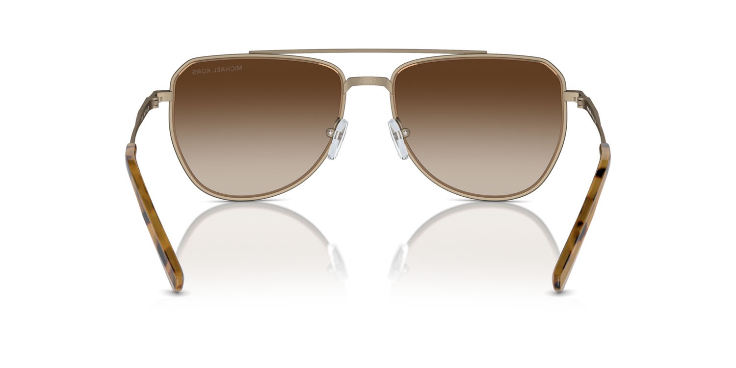Occhiali da sole Michael Kors Whistler MK 1155 (100113) colore husk opaco forma aviator lenti marrone sfumato