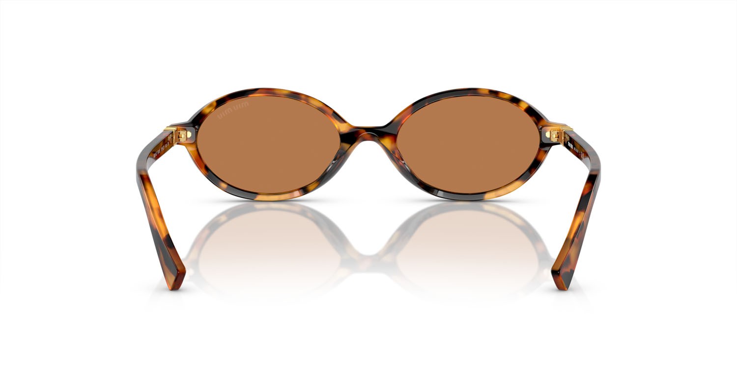 Occhiali da sole Miu Miu MU 04ZS (19P2Z1) colore havana chiaro forma ovale lenti marrone