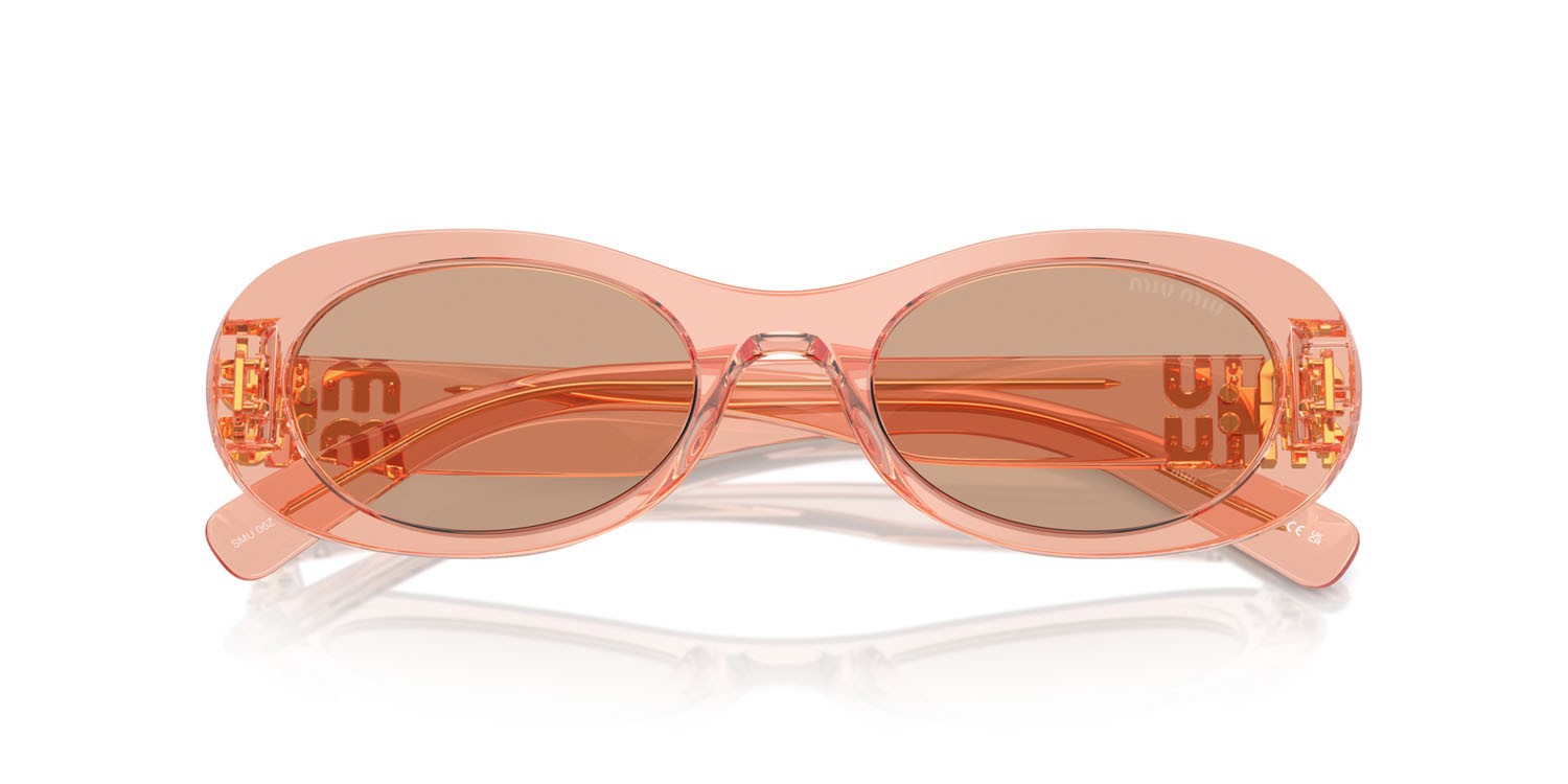 Occhiali da sole Miu Miu MU 06ZS (13T1P1) colore noisette transparent forma ovale lenti marrone scuro