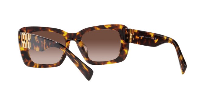 Occhiali da sole Miu Miu MU 07YS (VAU6S1) colore havana miele forma rettangolare lenti marrone sfumato