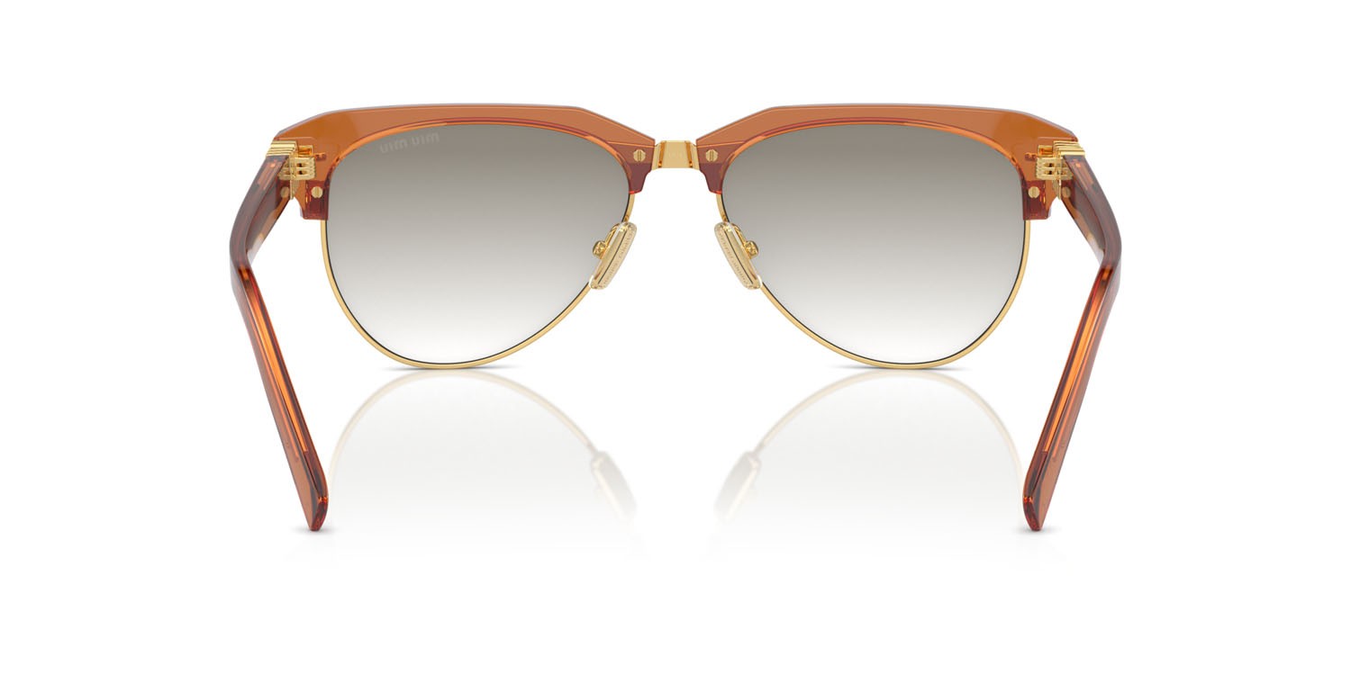 Occhiali da sole Miu Miu MU 09ZS (15T8K1) colore caramello forma aviator lenti sfumata argento trasparente