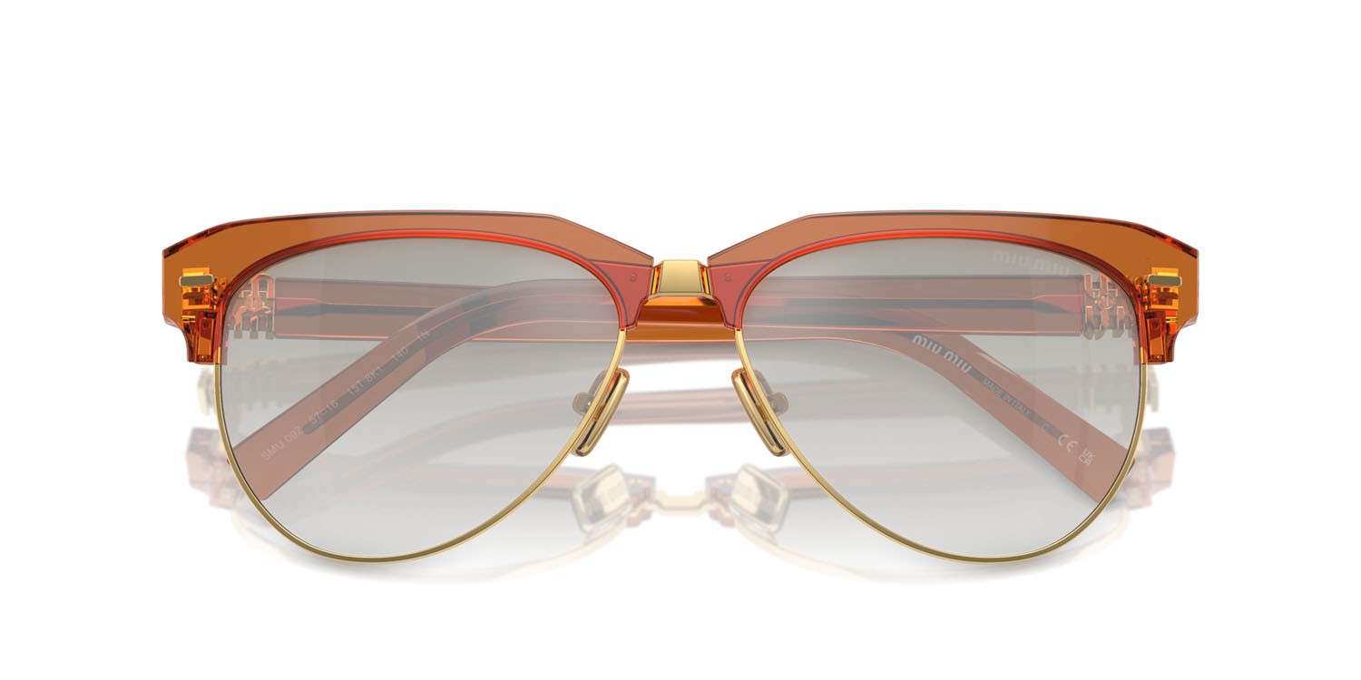 Occhiali da sole Miu Miu MU 09ZS (15T8K1) colore caramello forma aviator lenti sfumata argento trasparente