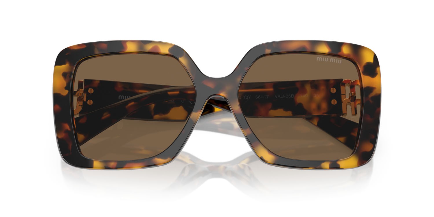 Sunglasses Miu Miu MU 10YS (VAU06B) color havana miele shape irregular lenses marrone scuro