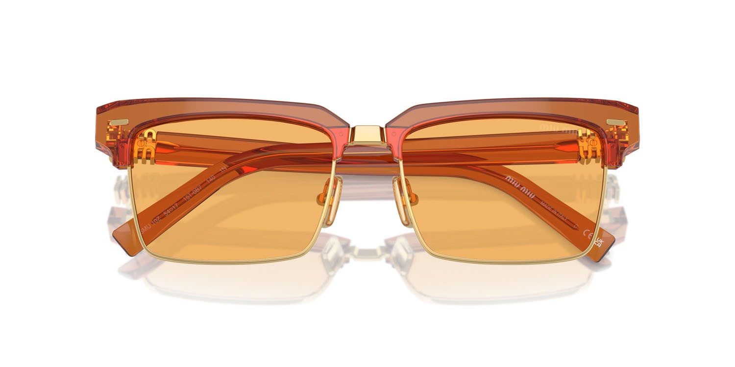 Occhiali da sole Miu Miu MU 10ZS (15T0B7) colore caramel trasparent forma quadrato lenti giallo