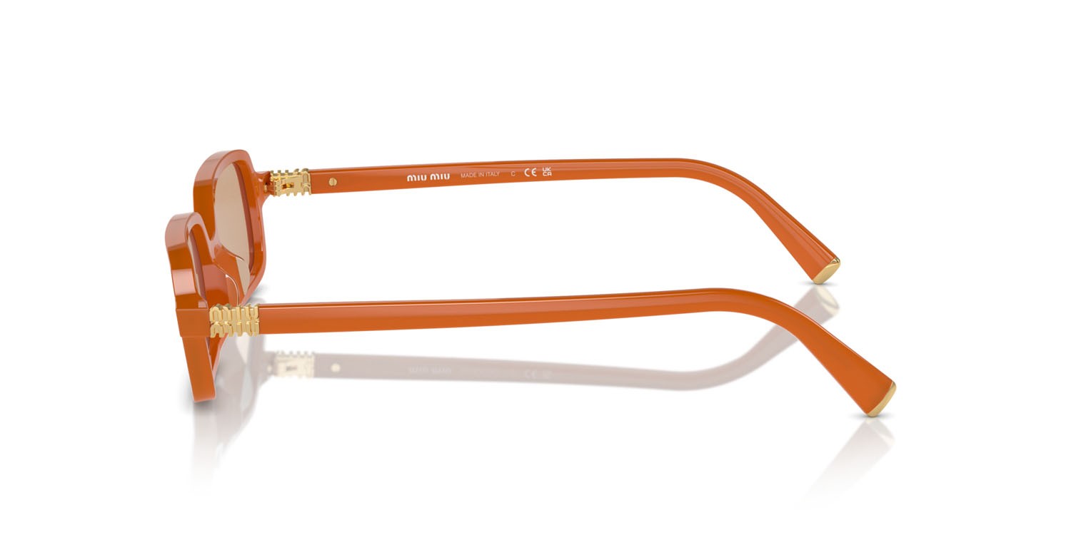 Occhiali da sole Miu Miu MU 11ZS (11V40D) colore turmeric opal forma rettangolare 