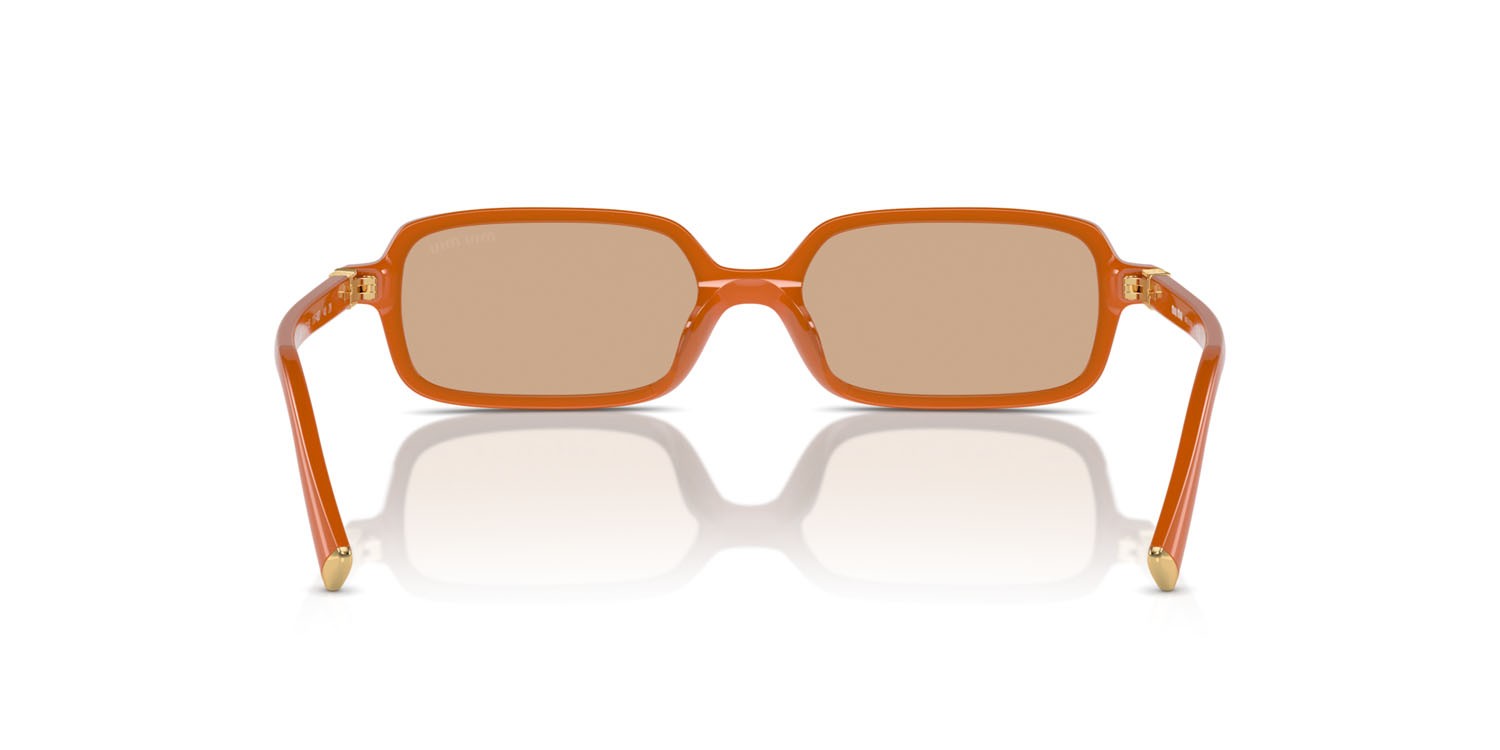 Occhiali da sole Miu Miu MU 11ZS (11V40D) colore turmeric opal forma rettangolare 