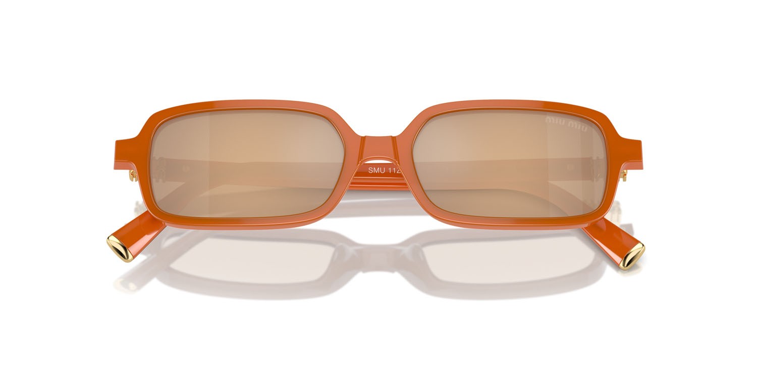 Occhiali da sole Miu Miu MU 11ZS (11V40D) colore turmeric opal forma rettangolare 