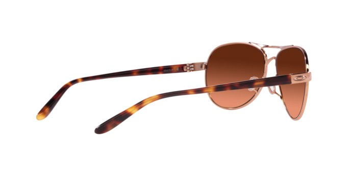 Occhiali da sole Oakley Feedback OO 4079 (407946) colore oro rosa forma ovale lenti prizm marrone sfumato