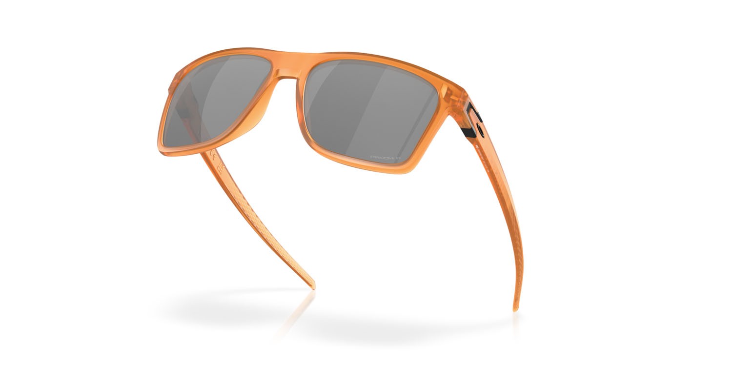 Occhiali da sole Oakley Leffingwell OO 9100 (910019) colore matte transparent ginger forma rettangolare lenti prizm black polarized