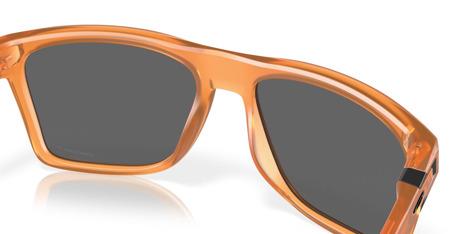 Occhiali da sole Oakley Leffingwell OO 9100 (910019) colore matte transparent ginger forma rettangolare lenti prizm black polarized