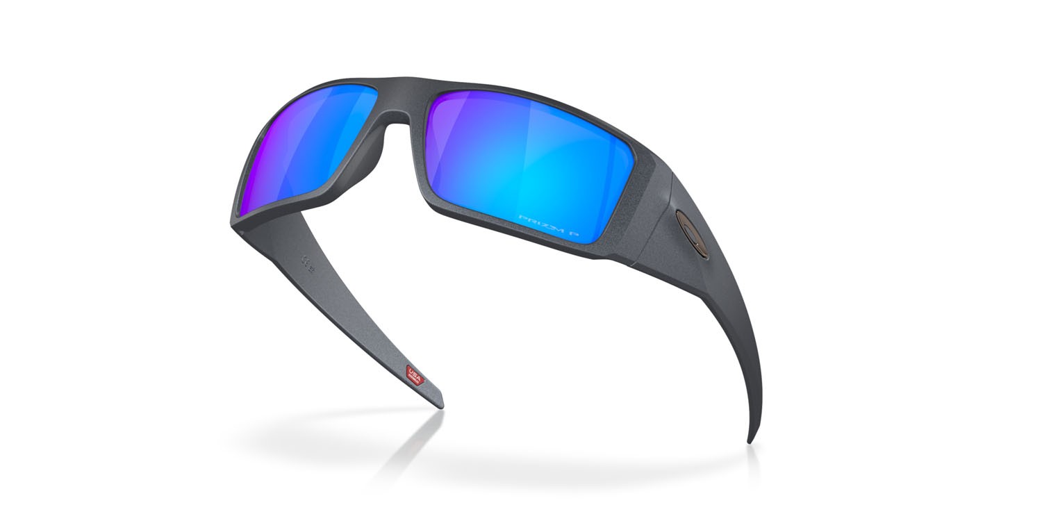 Occhiali da sole Oakley Heliostat OO 9231 (923113) colore acciaio blu forma rettangolare lenti prizm sapphire polarized