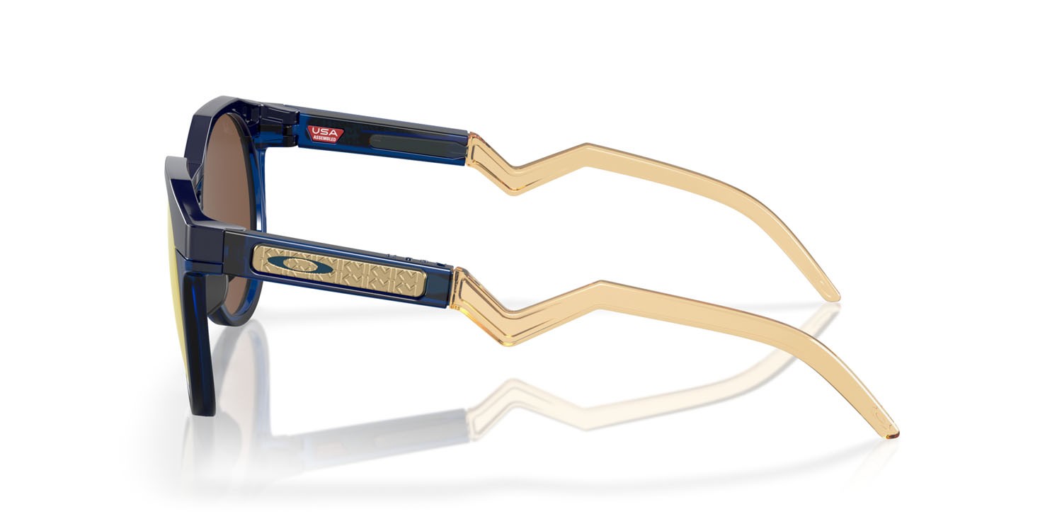 Occhiali da sole Oakley HSTN Kylian Mbappè OO 9242 (924211) colore navy/transparent blue forma rotondo lenti prizm 24k polarized