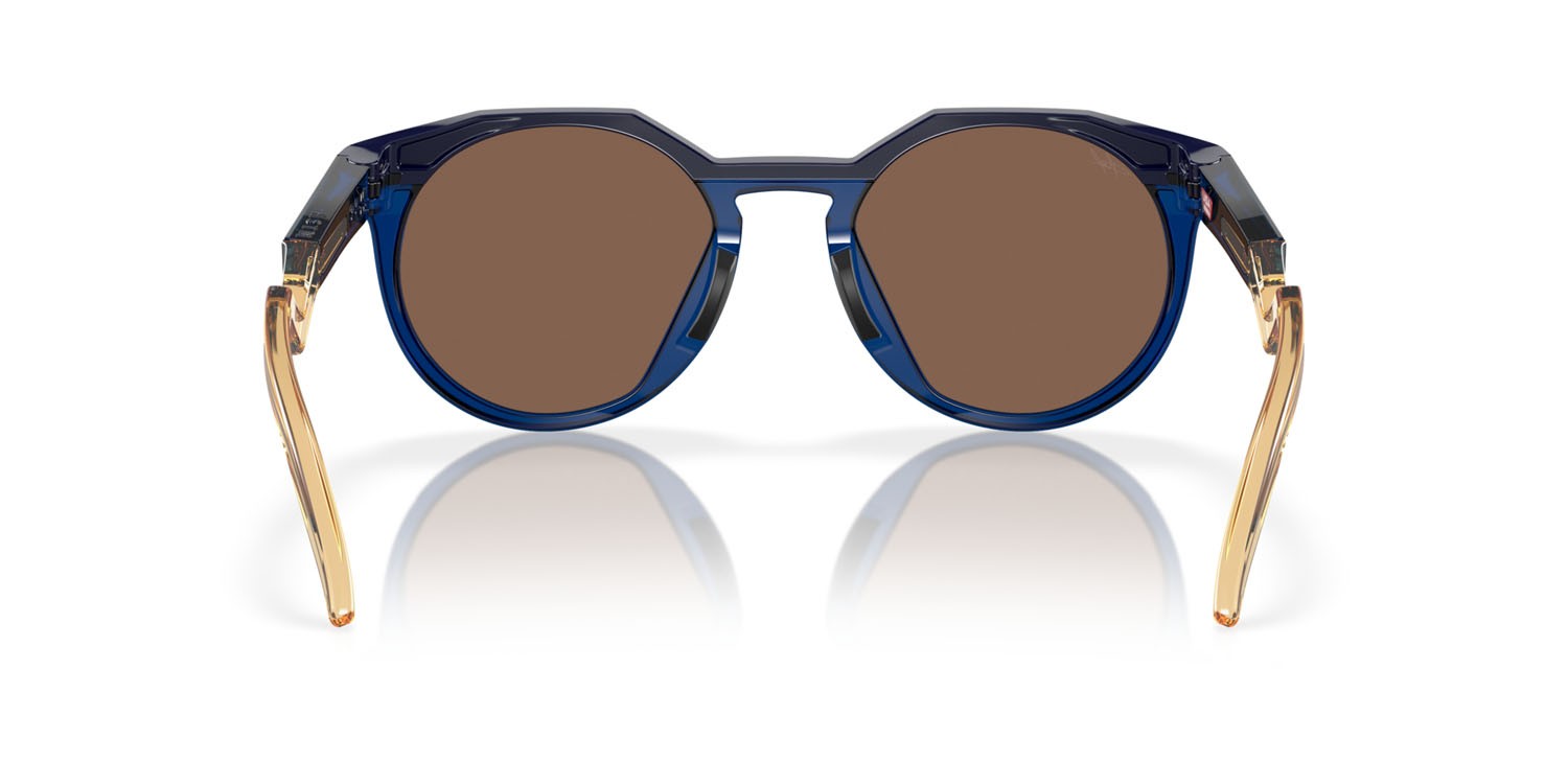 Occhiali da sole Oakley HSTN Kylian Mbappè OO 9242 (924211) colore navy/transparent blue forma rotondo lenti prizm 24k polarized