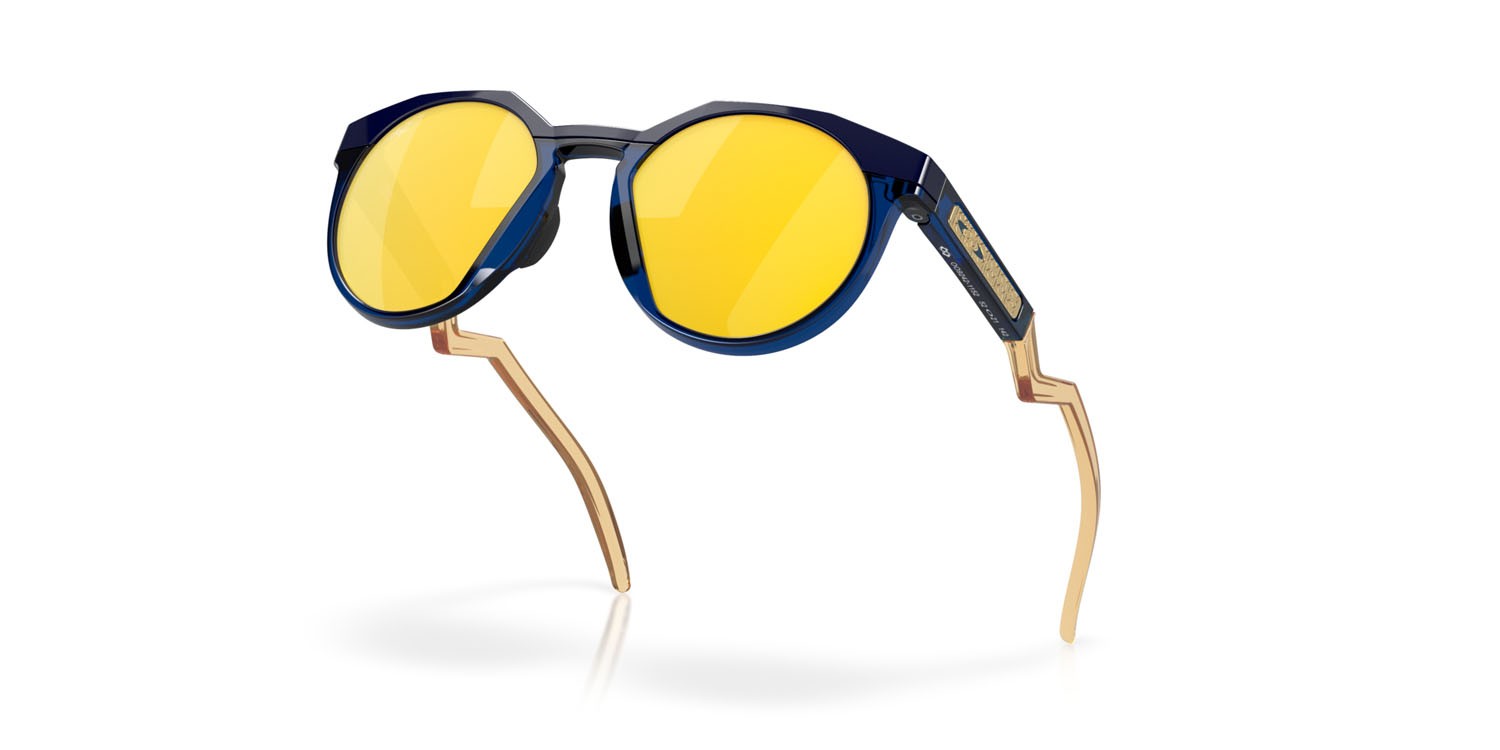 Occhiali da sole Oakley HSTN Kylian Mbappè OO 9242 (924211) colore navy/transparent blue forma rotondo lenti prizm 24k polarized