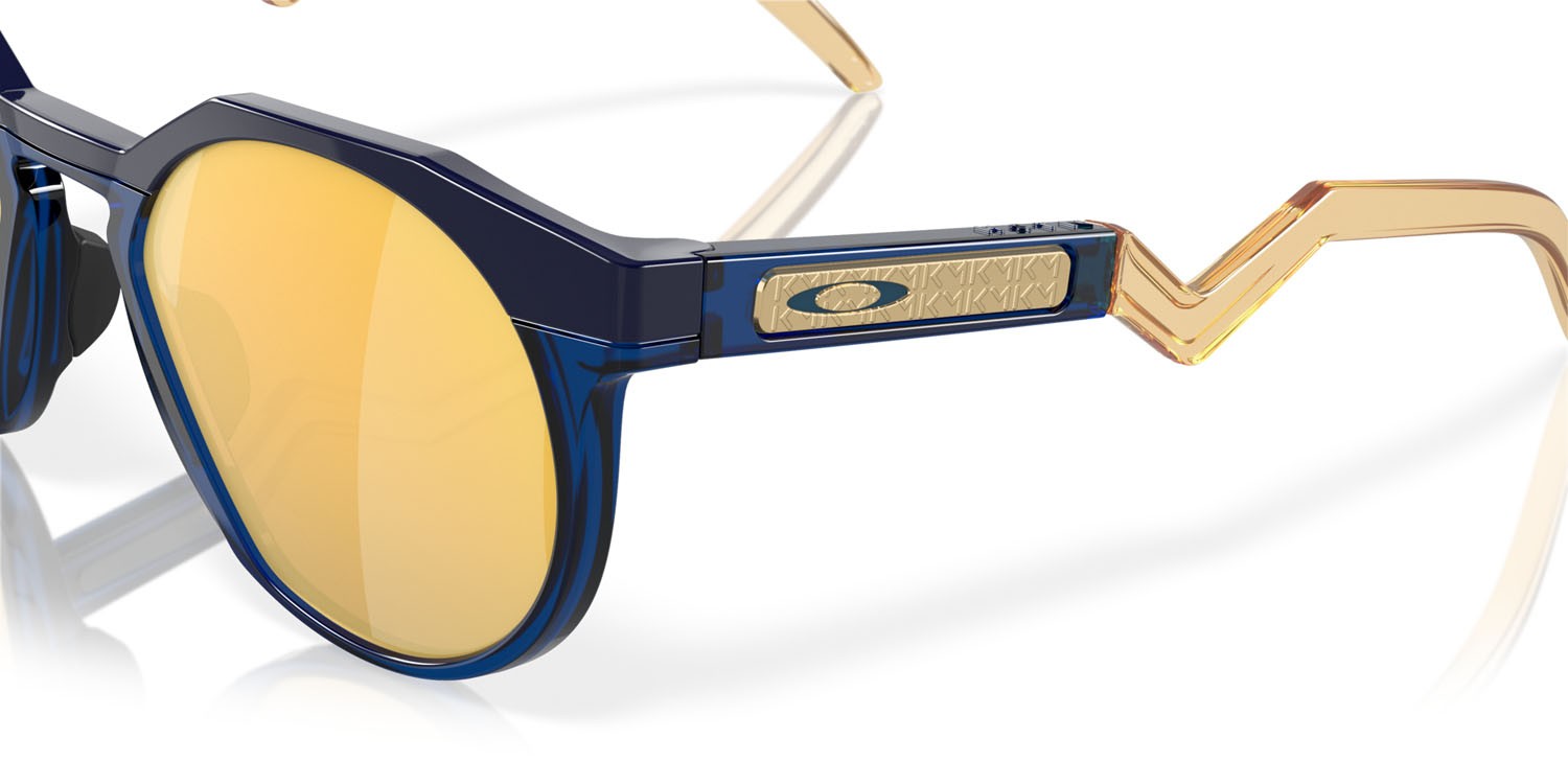 Occhiali da sole Oakley HSTN Kylian Mbappè OO 9242 (924211) colore navy/transparent blue forma rotondo lenti prizm 24k polarized