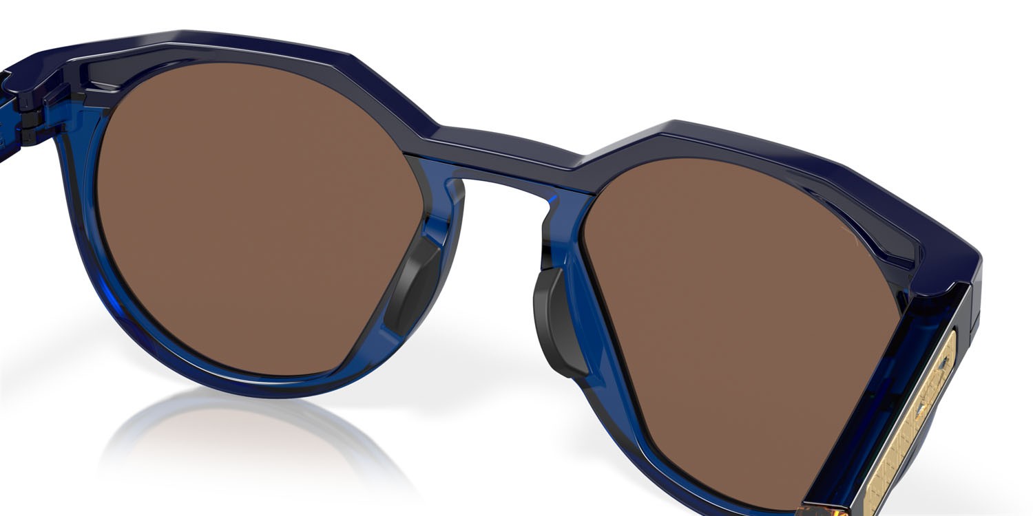 Occhiali da sole Oakley HSTN Kylian Mbappè OO 9242 (924211) colore navy/transparent blue forma rotondo lenti prizm 24k polarized