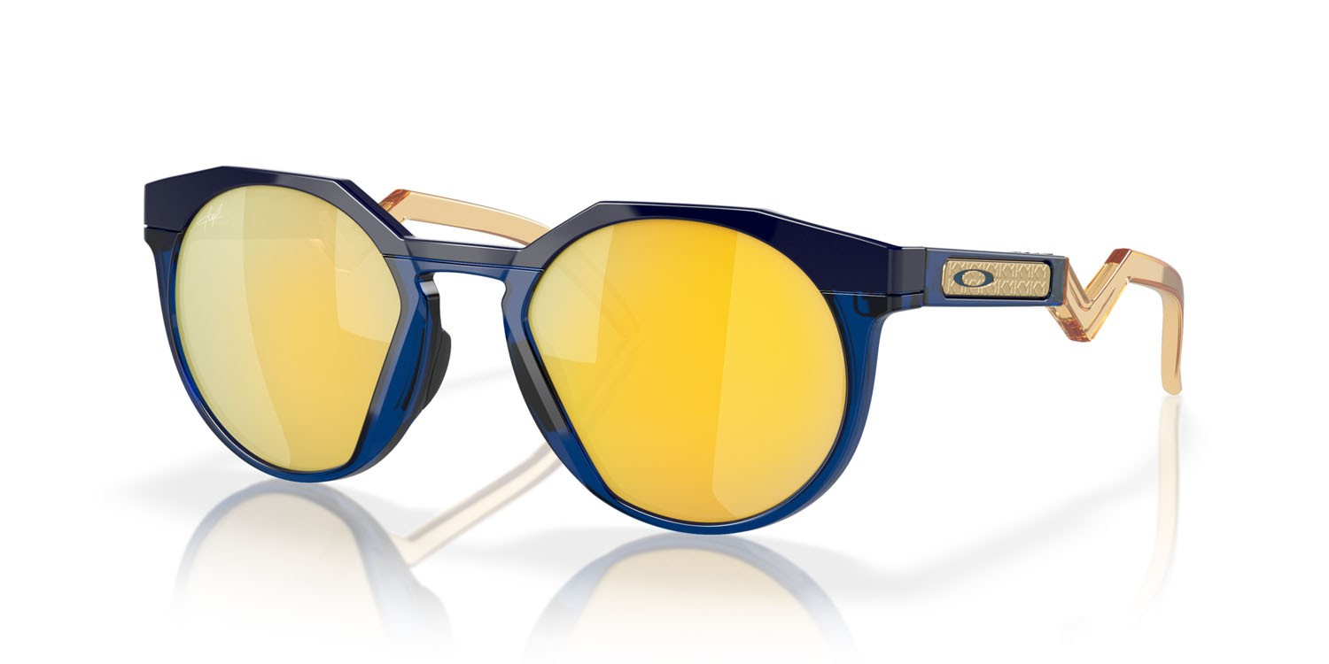Occhiali da sole Oakley HSTN Kylian Mbappè OO 9242 (924211) colore navy/transparent blue forma rotondo lenti prizm 24k polarized