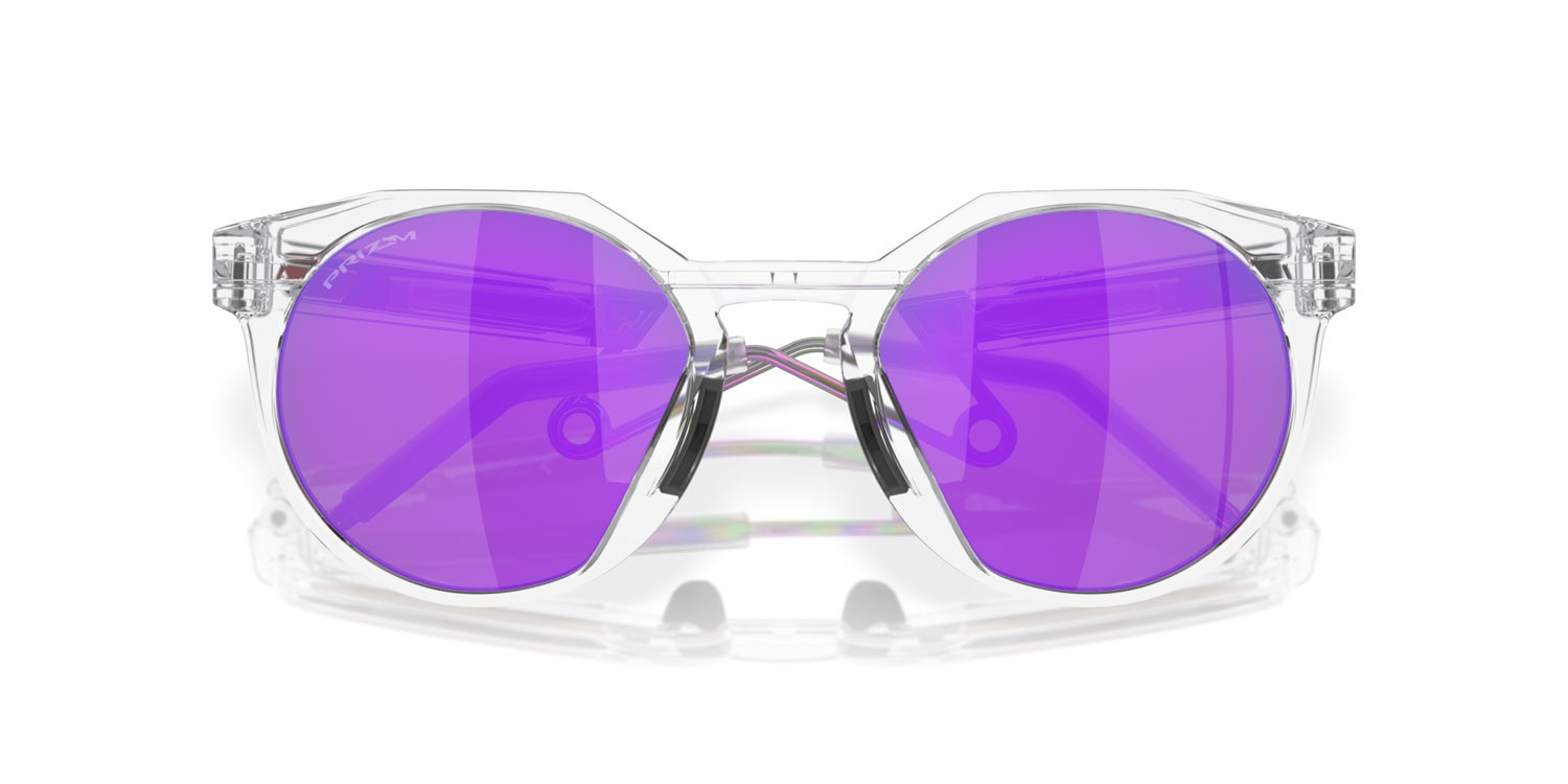 Occhiali da sole Oakley HSTN Metal OO 9279 (927902) colore trasparente opaco forma rotondo lenti prizm violet