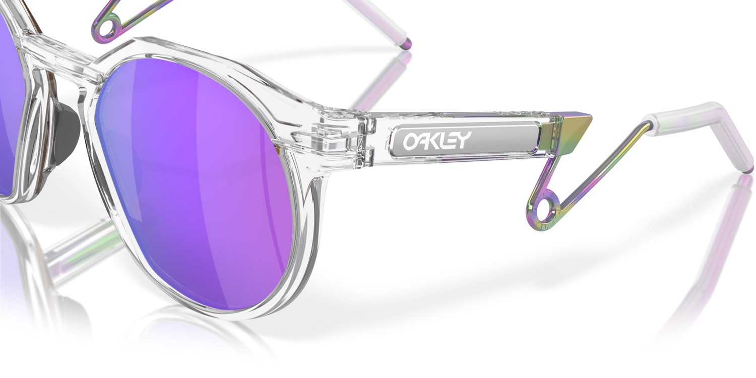 Occhiali da sole Oakley HSTN Metal OO 9279 (927902) colore trasparente opaco forma rotondo lenti prizm violet