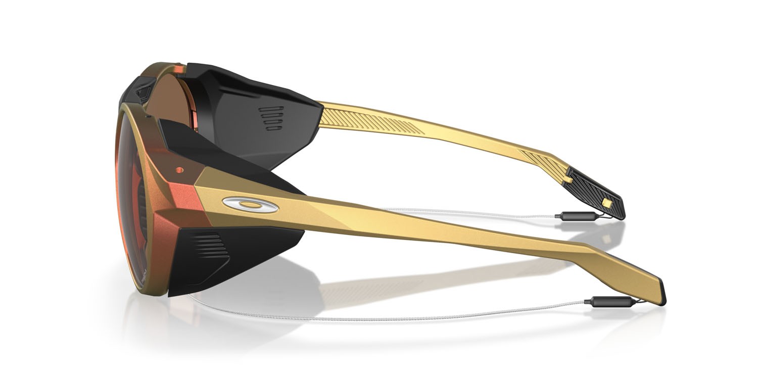 Occhiali da sole Oakley Clifden OO 9440 (944023) colore matte red gold colorshift forma rotondo lenti prizm bronze