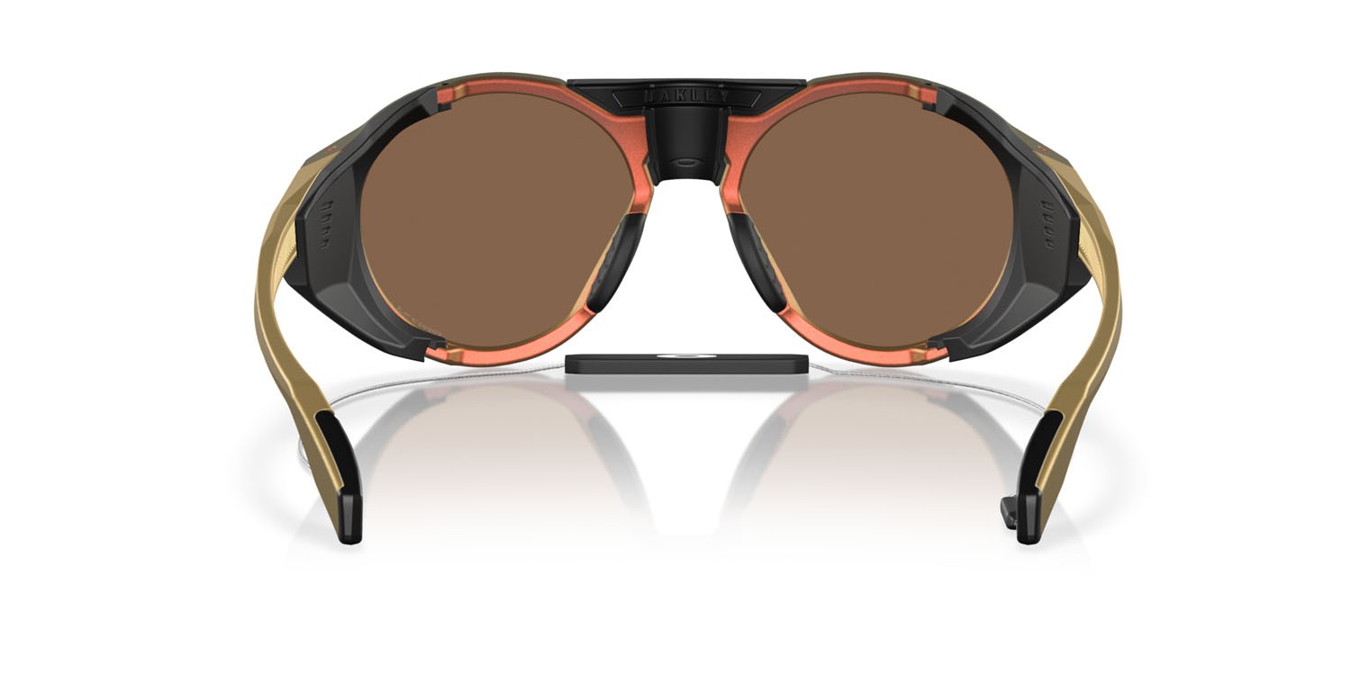 Occhiali da sole Oakley Clifden OO 9440 (944023) colore matte red gold colorshift forma rotondo lenti prizm bronze