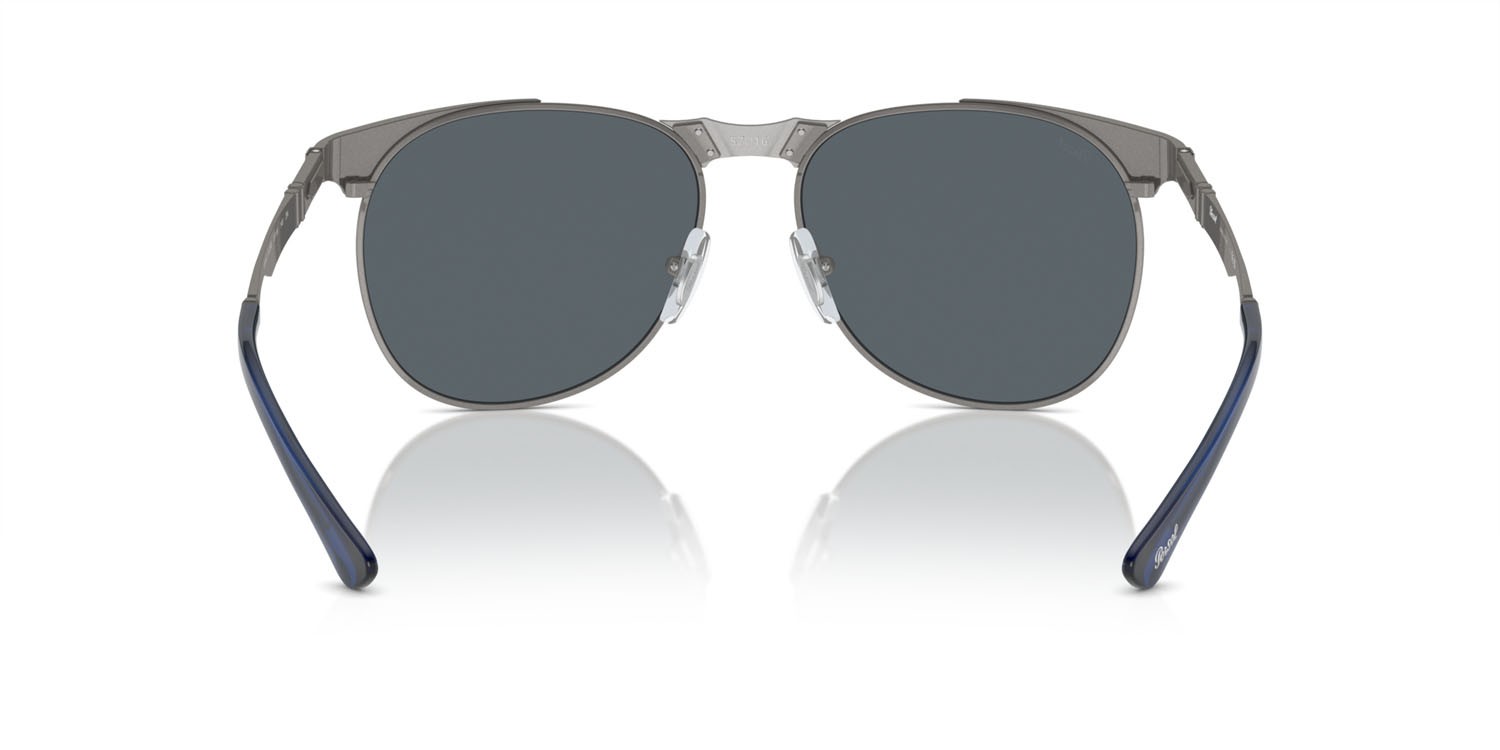 Occhiali da sole Persol PO 1016S (513/R5) colore gunmetal forma aviator lenti blu