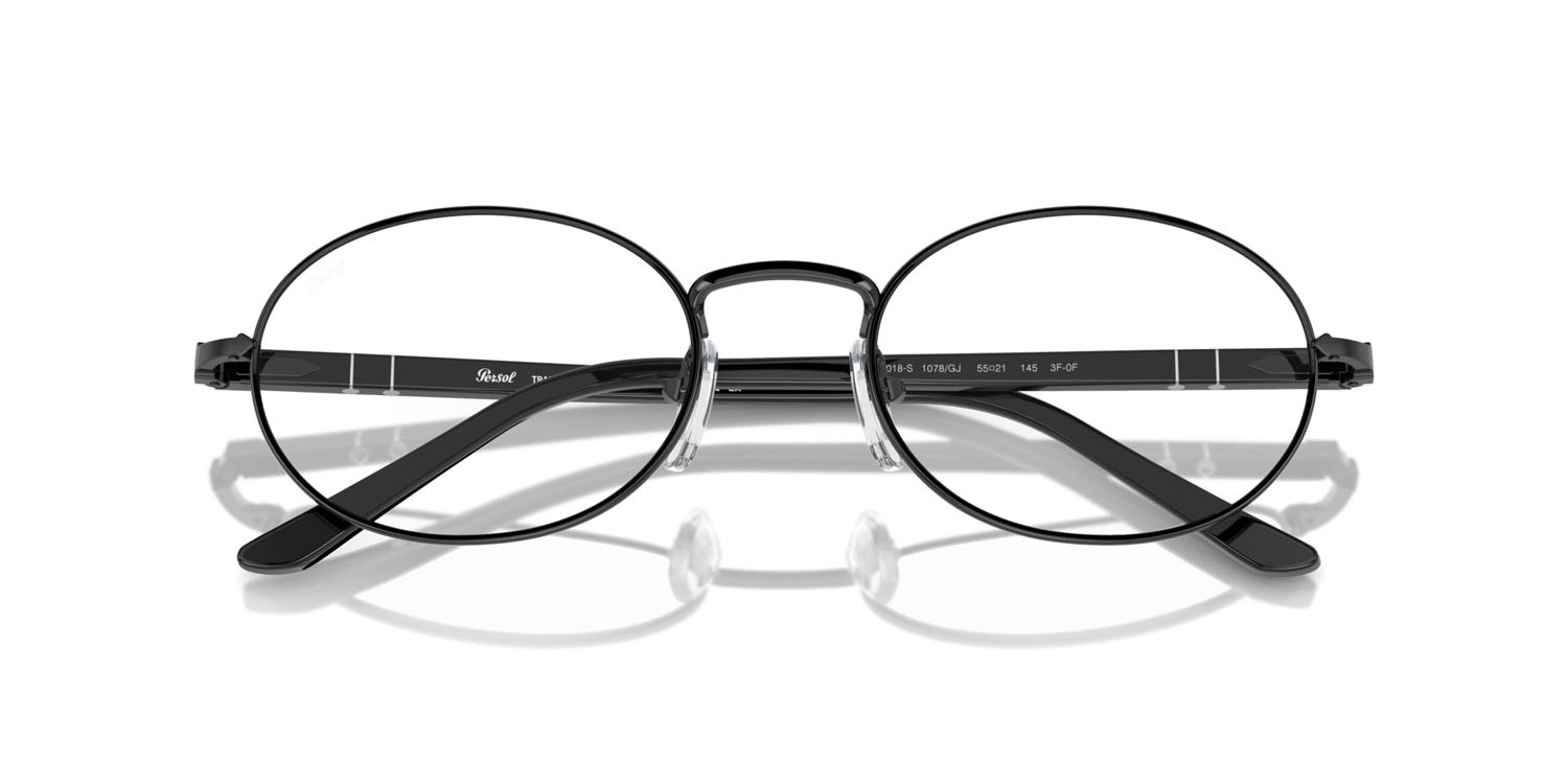 Occhiali da sole Persol Ida PO 1018S (1078GJ) colore nero forma ovale lenti transitions clear to green