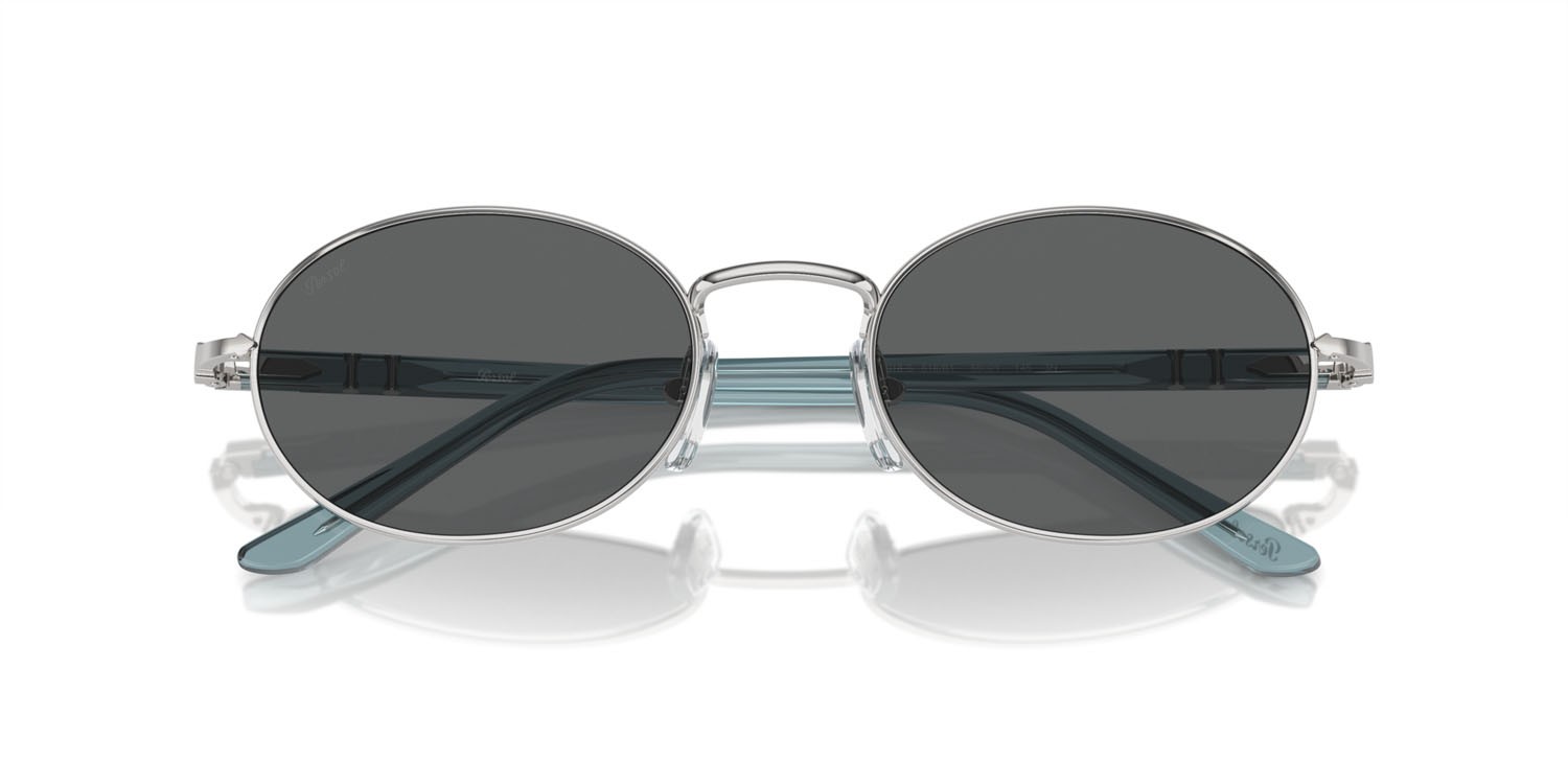Occhiali da sole Persol Ida PO 1018S (518/B1) colore argento forma ovale lenti grigio scuro