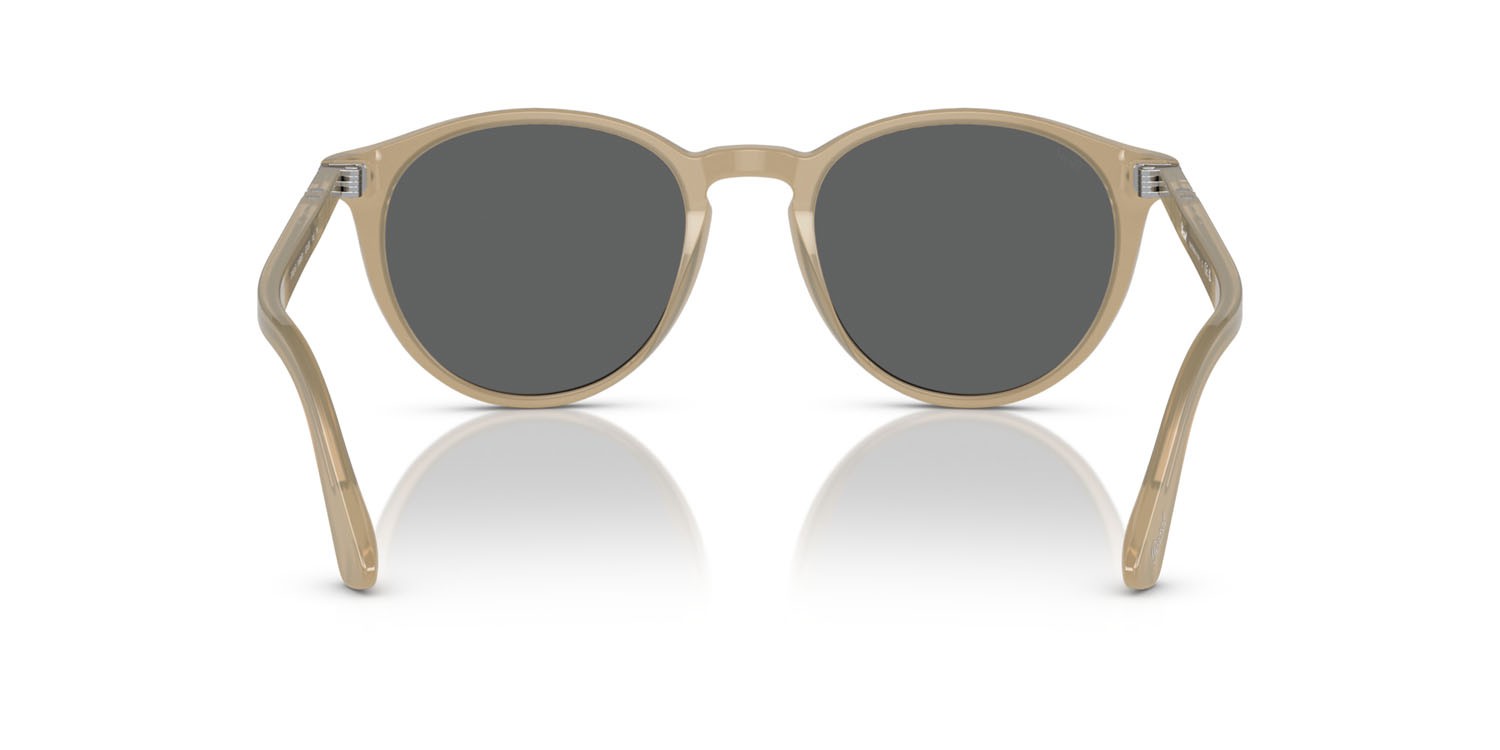 Occhiali da sole Persol PO 3152S (1169B1) colore beige opalino forma rotondo lenti grigio scuro