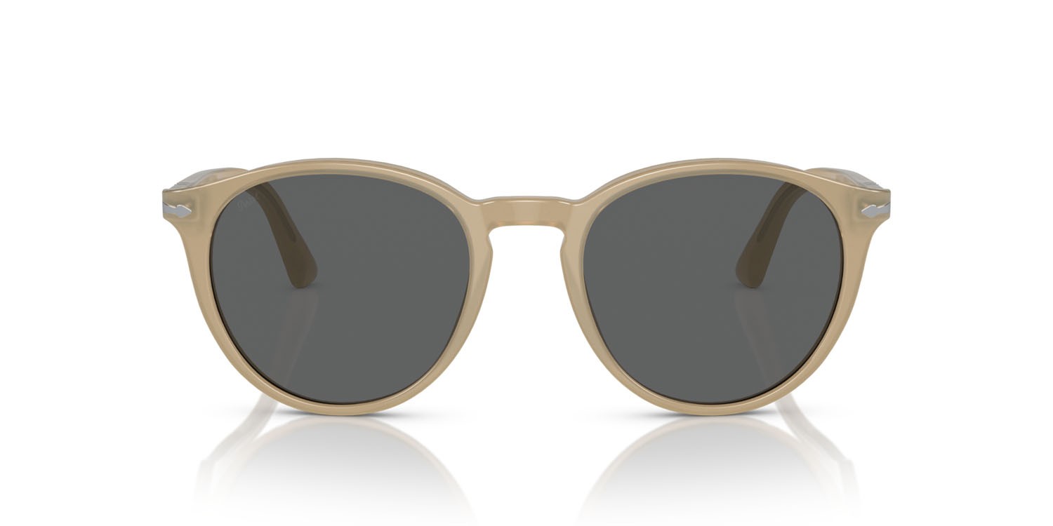 Occhiali da sole Persol PO 3152S (1169B1) colore beige opalino forma rotondo lenti grigio scuro