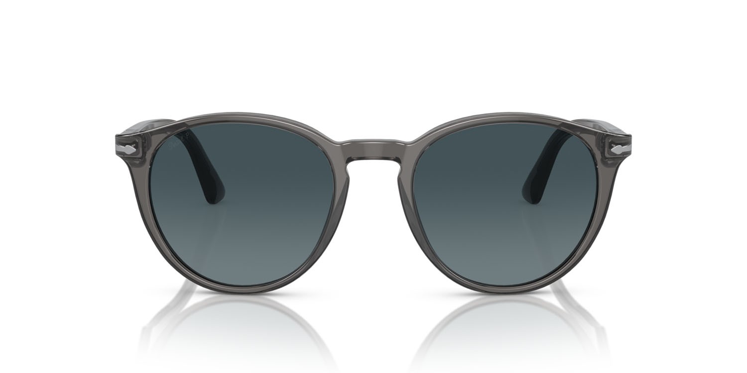 Occhiali da sole Persol PO 3152S (1196S3) colore grigio trasparente forma rotondo lenti light blue gradient dark blue polar