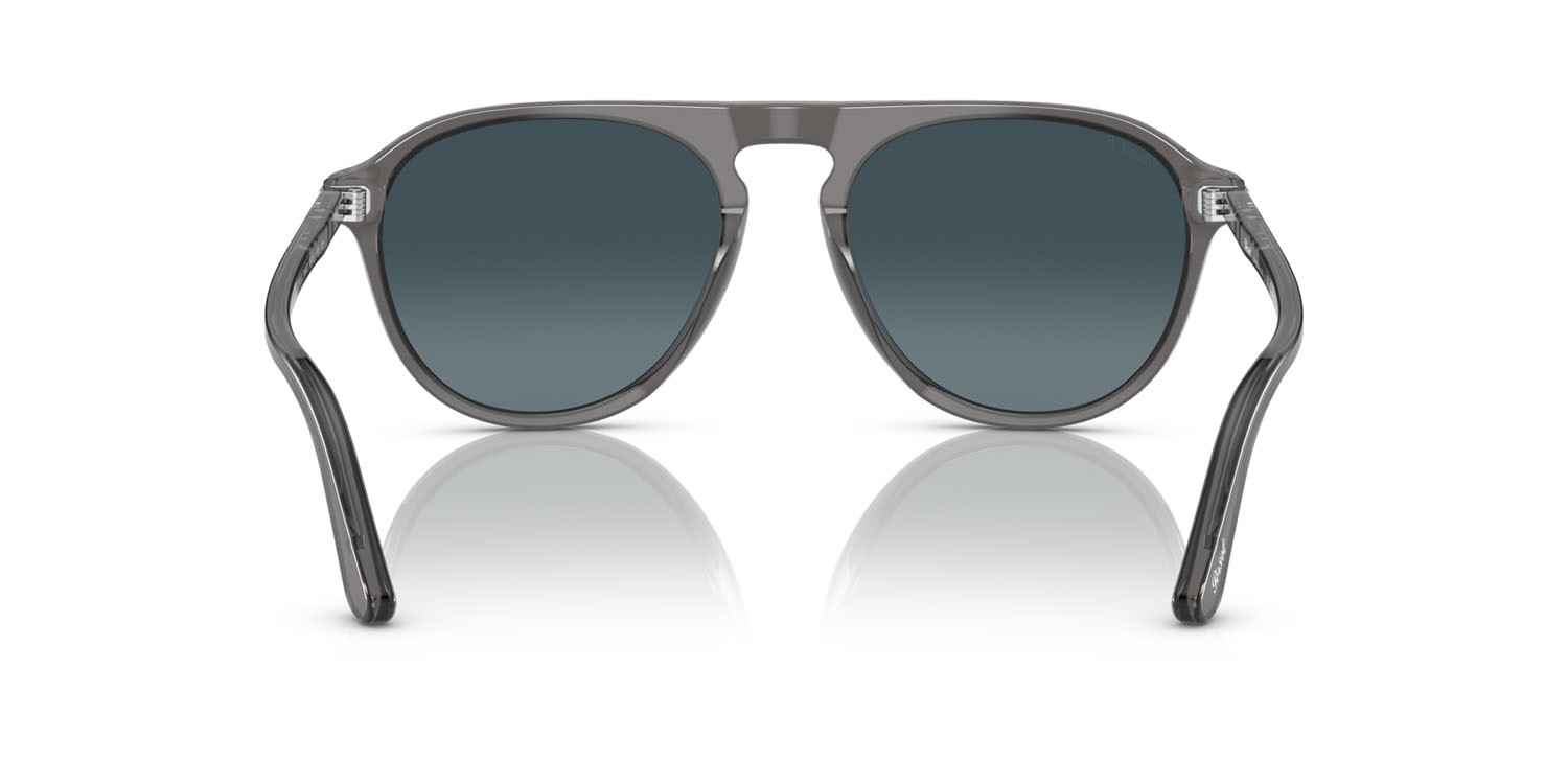 Occhiali da sole Persol PO 3302S (1196S3) colore grigio trasparente forma aviator lenti light blue gradient dark blue polar