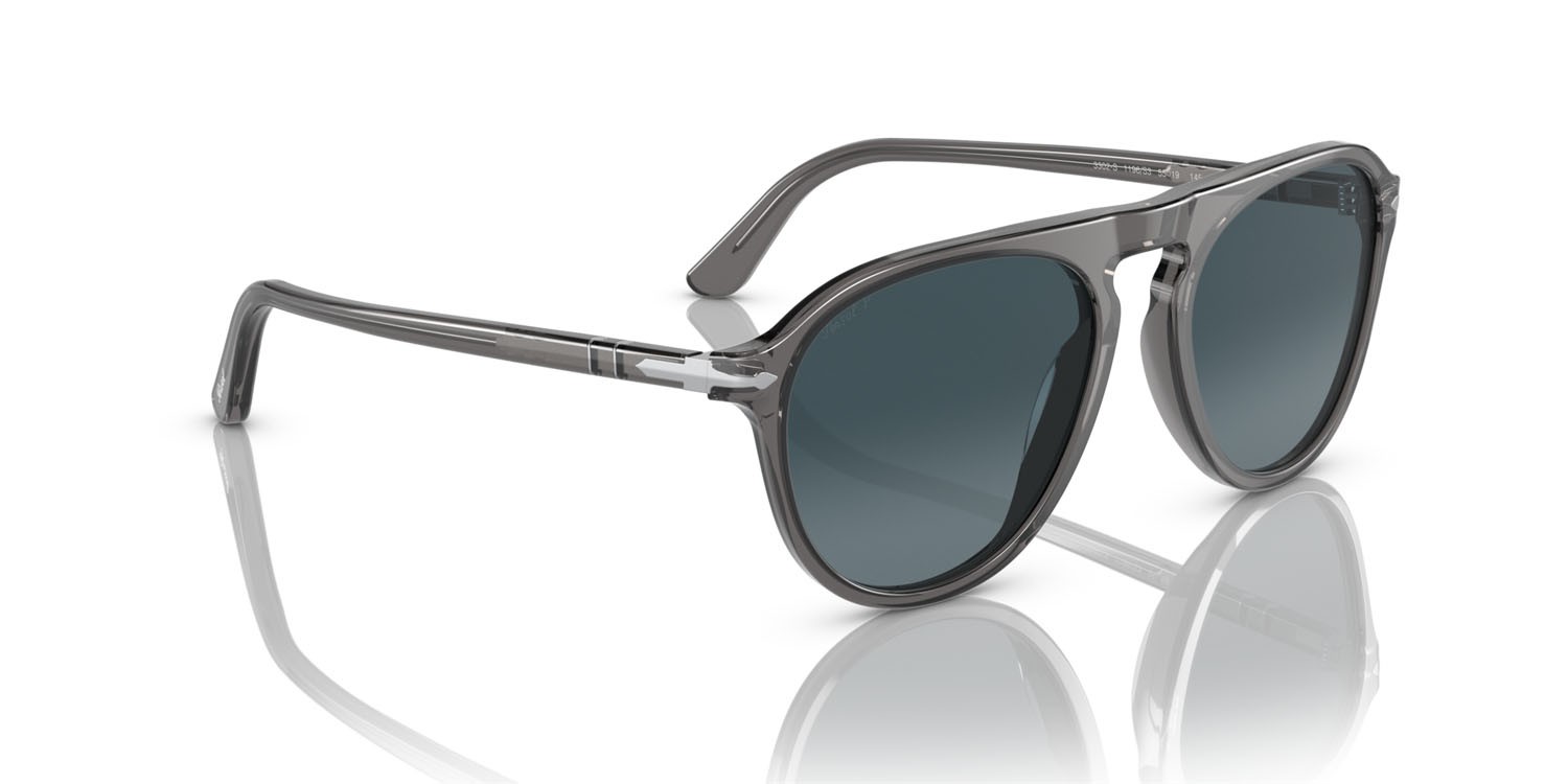 Occhiali da sole Persol PO 3302S (1196S3) colore grigio trasparente forma aviator lenti light blue gradient dark blue polar